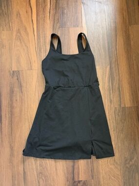 Sleek Black Scoop Mini Dress with Subtle Front Slit